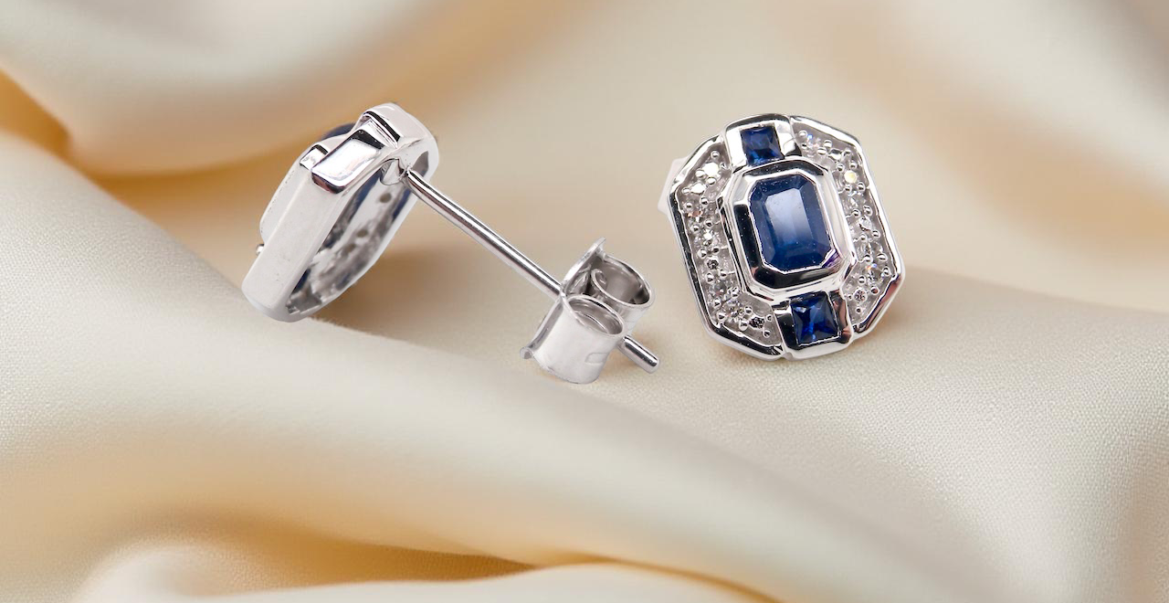 A pair 9 carat White Gold Sapphire & Diamond Earrings