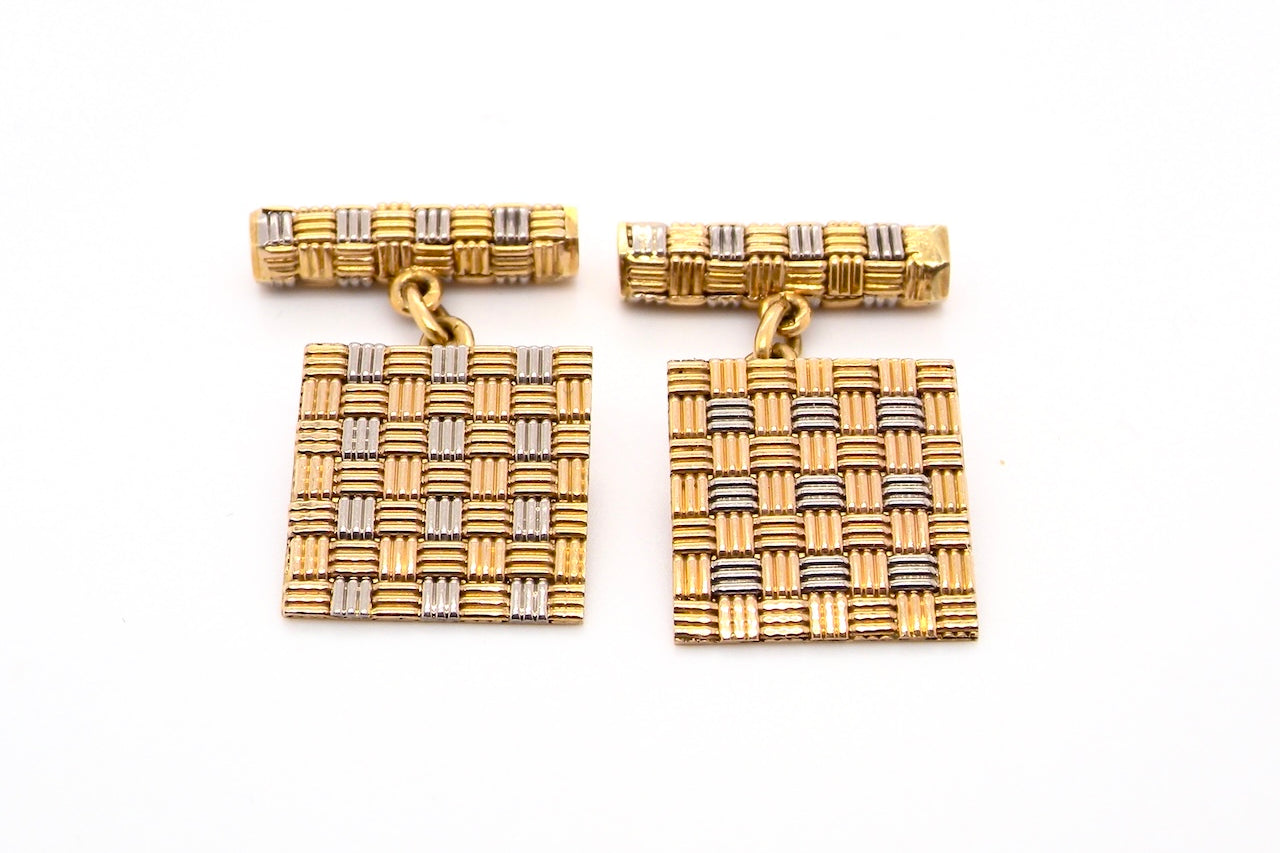A pair of 18 carat gold cuff links by famous London designer Roy King.