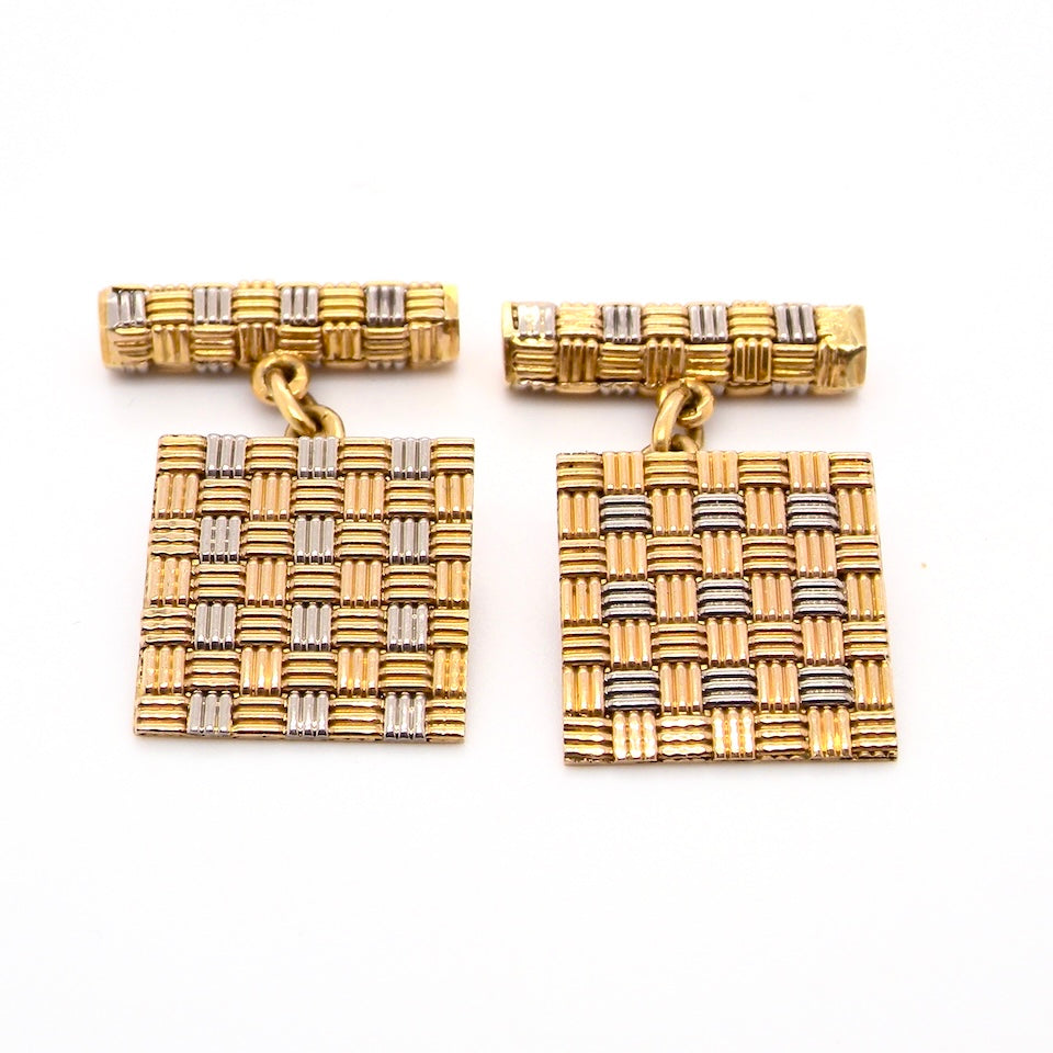 A pair of 18 carat gold cuff links by famous London designer Roy King.