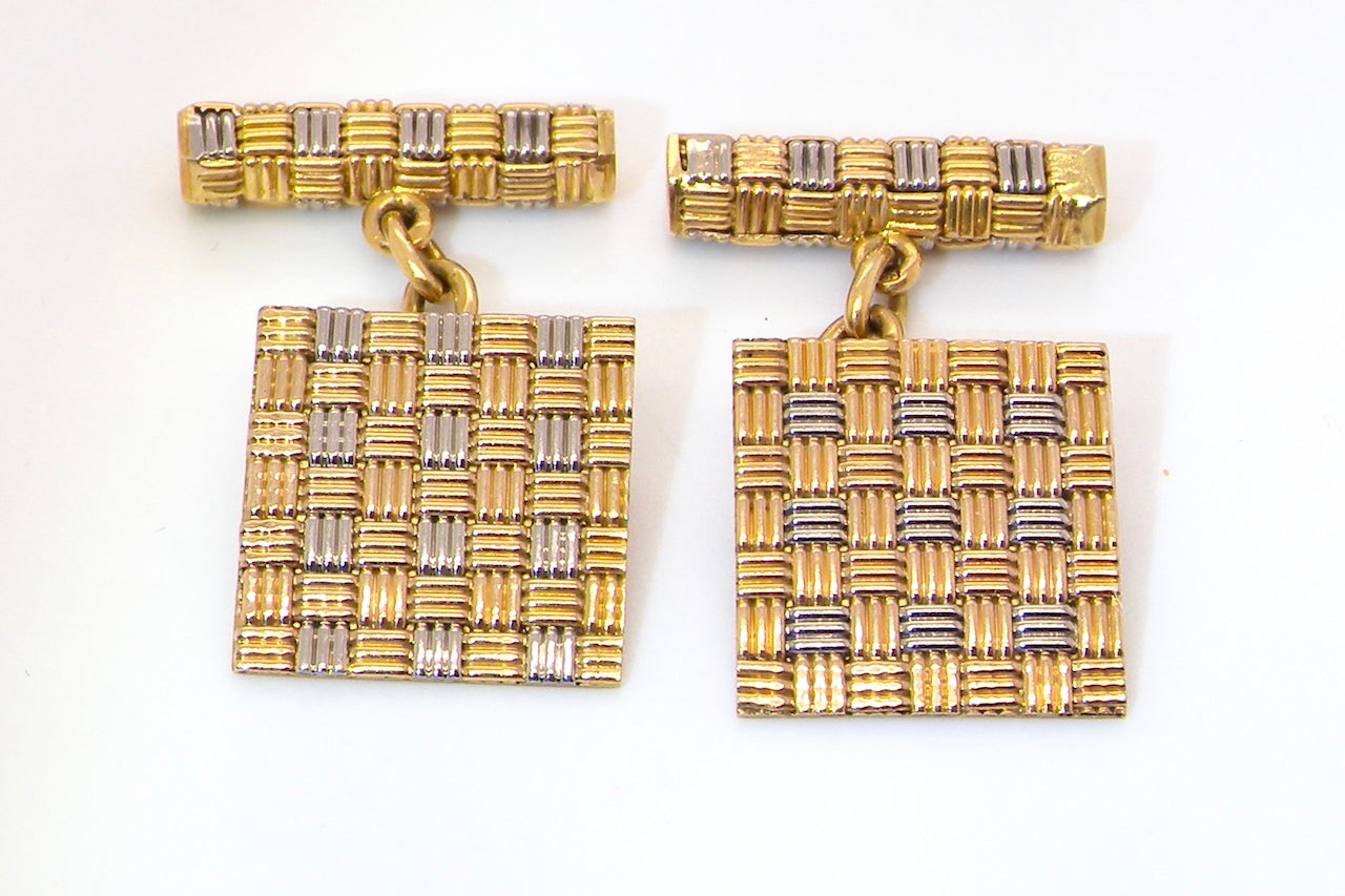 A pair of 18 carat gold cuff links by famous designer Roy King.