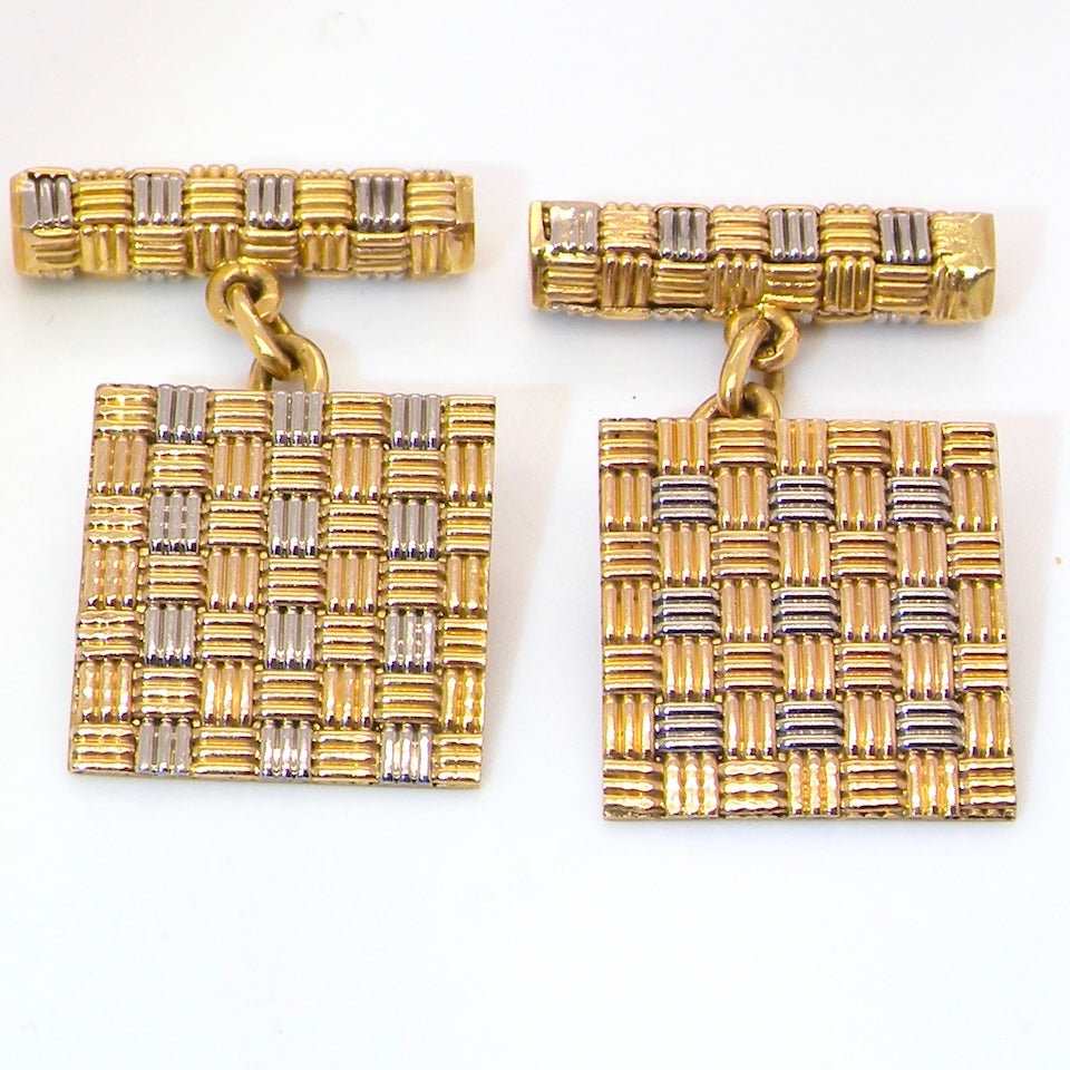 A pair of 18 carat gold cuff links by famous designer Roy King.