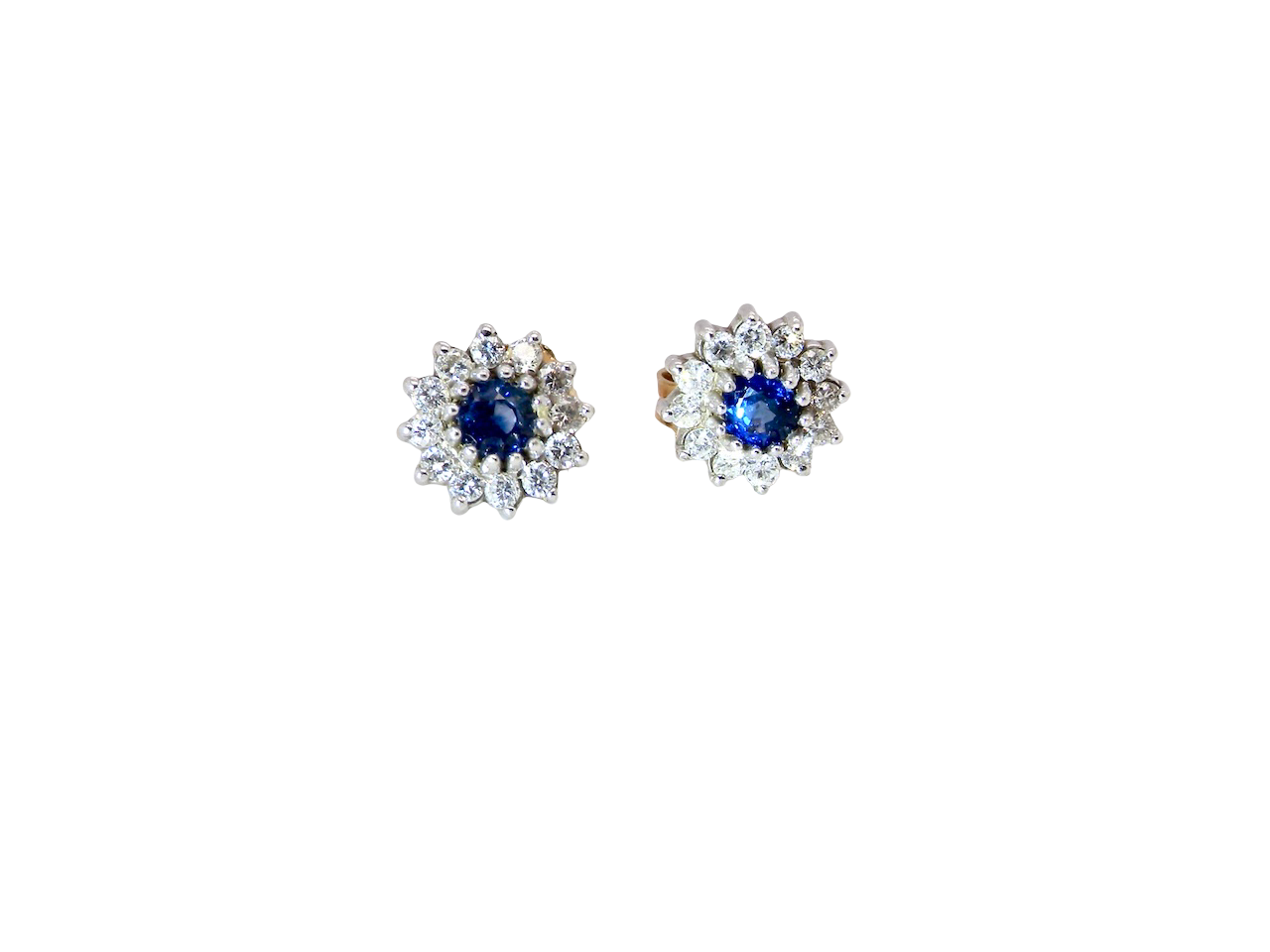 A pair of 9 carat gold earrings, each set with a sapphire centre stone,
