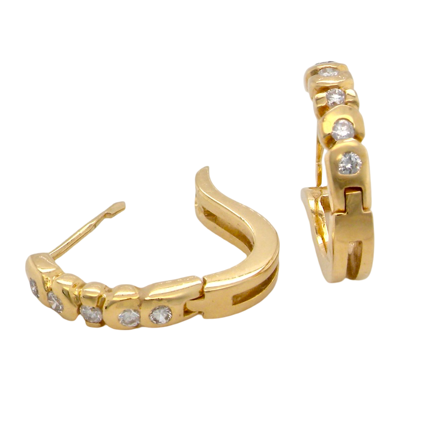 A pair of Diamond hoop earrings