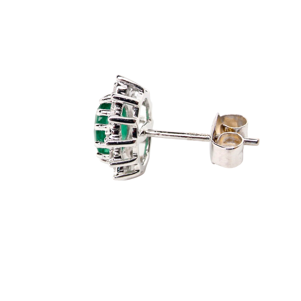 A pair of Emerald and Diamond earrings