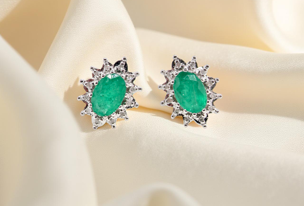 A pair of Emerald and Diamond earrings