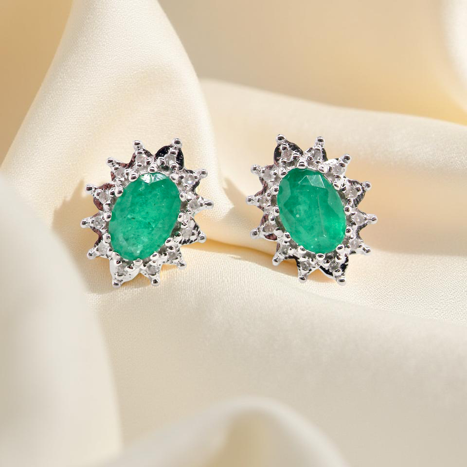 A pair of Emerald and Diamond earrings
