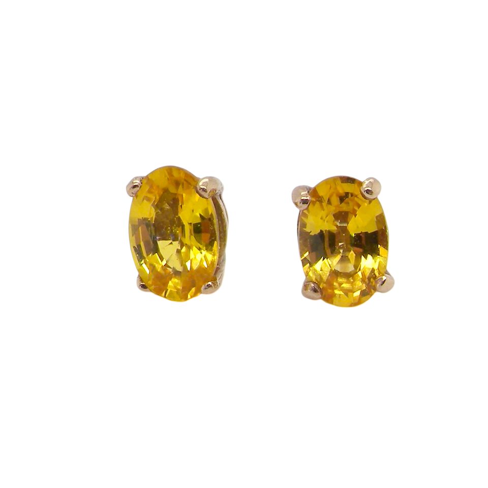 A pair of Yellow Sapphire earrings