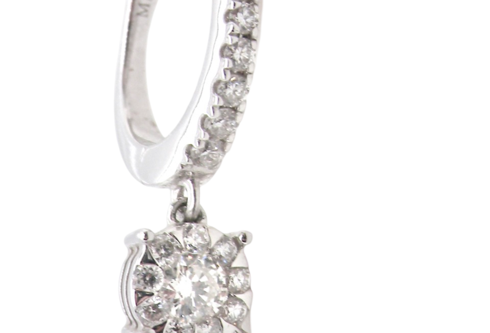 A pair of diamond hoop and drop earrings