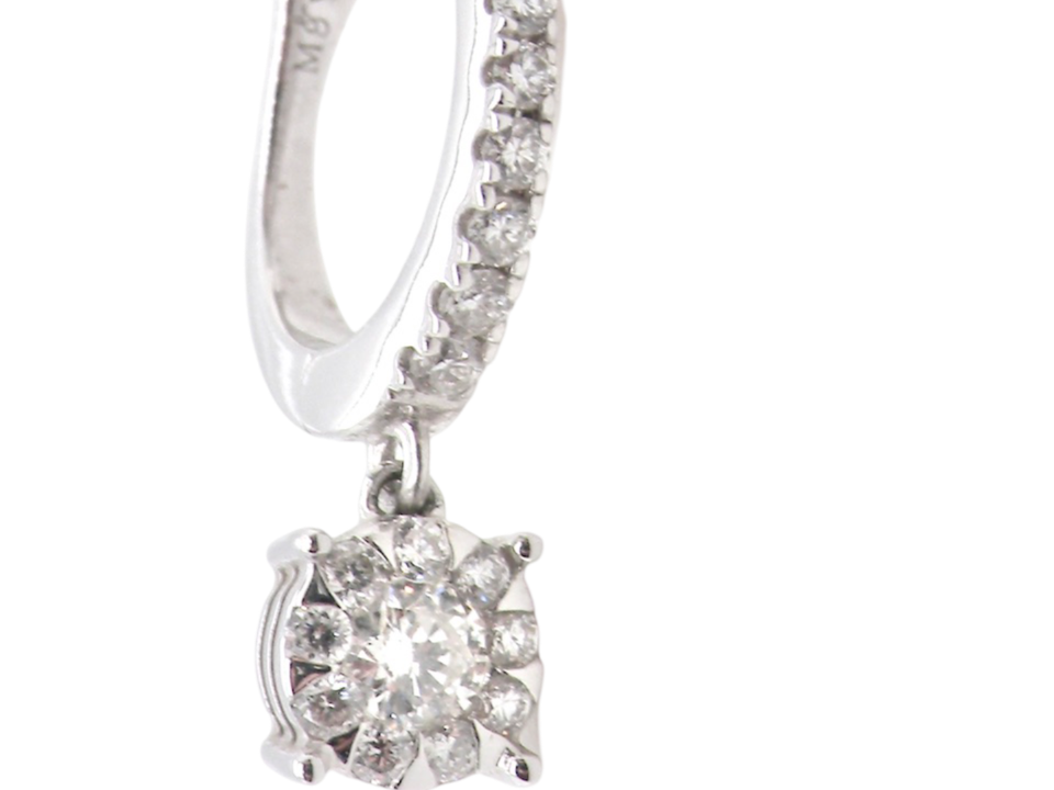 A pair of diamond hoop and drop earrings