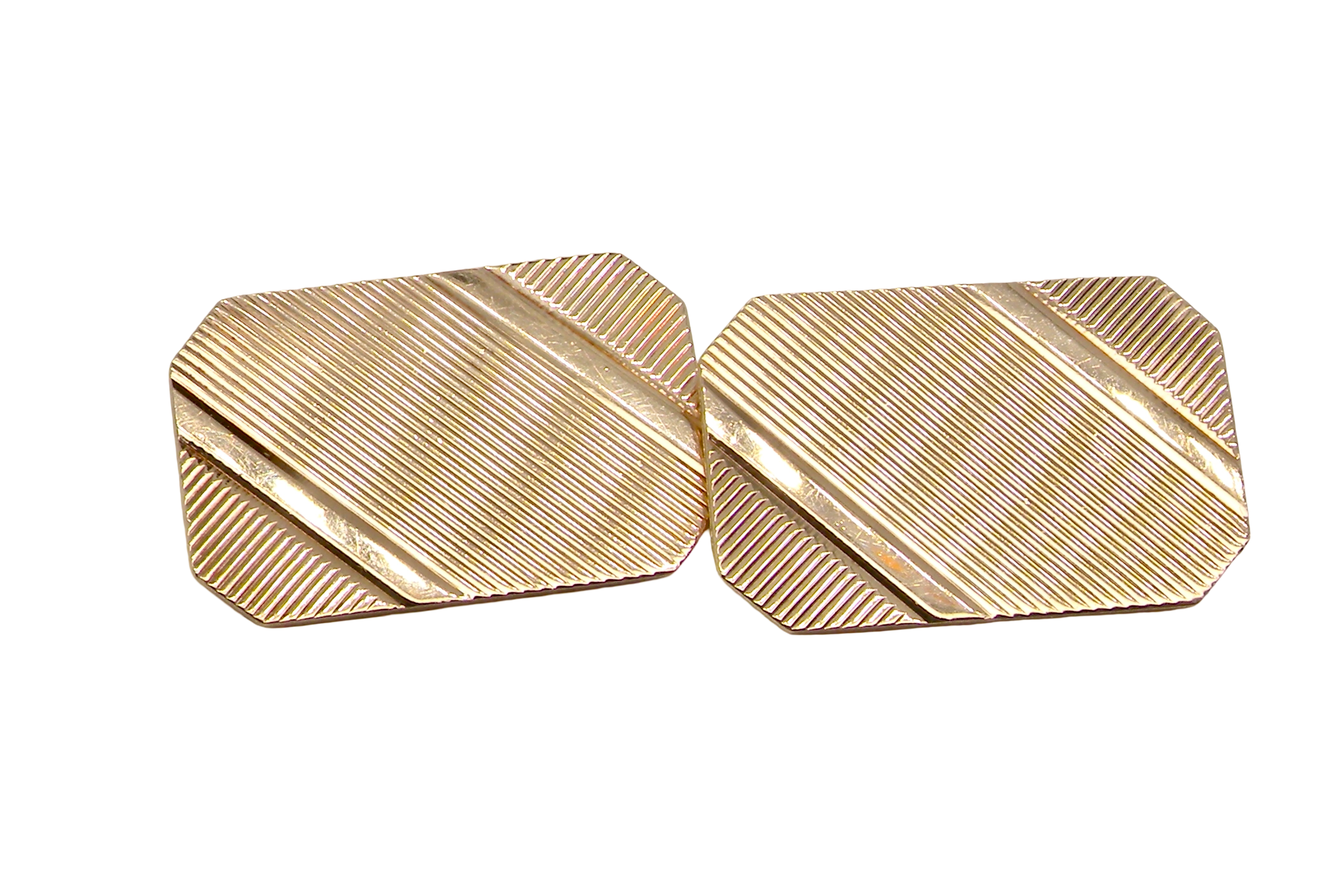 A pair of double link cufflinks. Each rectangular in shape, measure . 