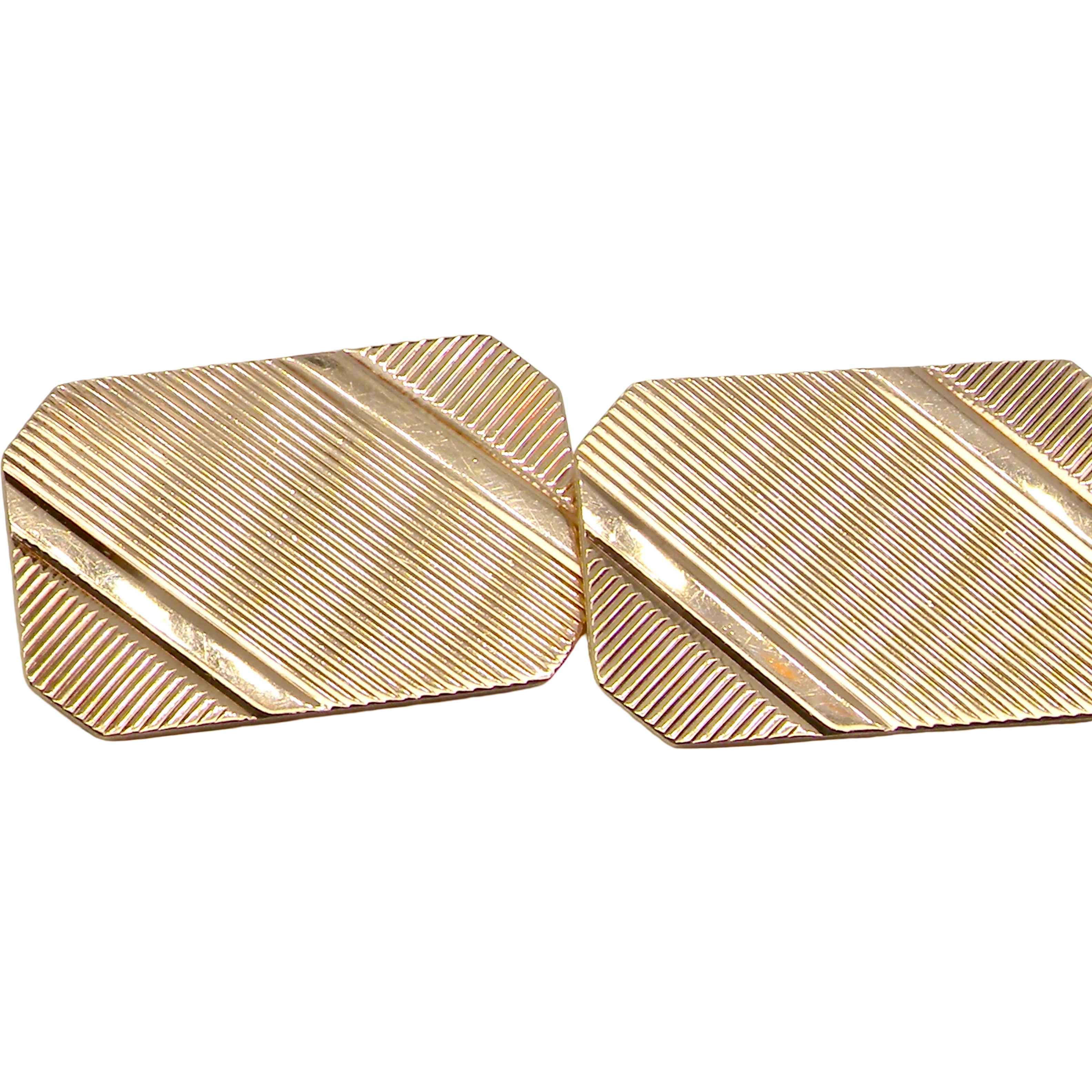 A pair of double link cufflinks. Each rectangular in shape, measure . 