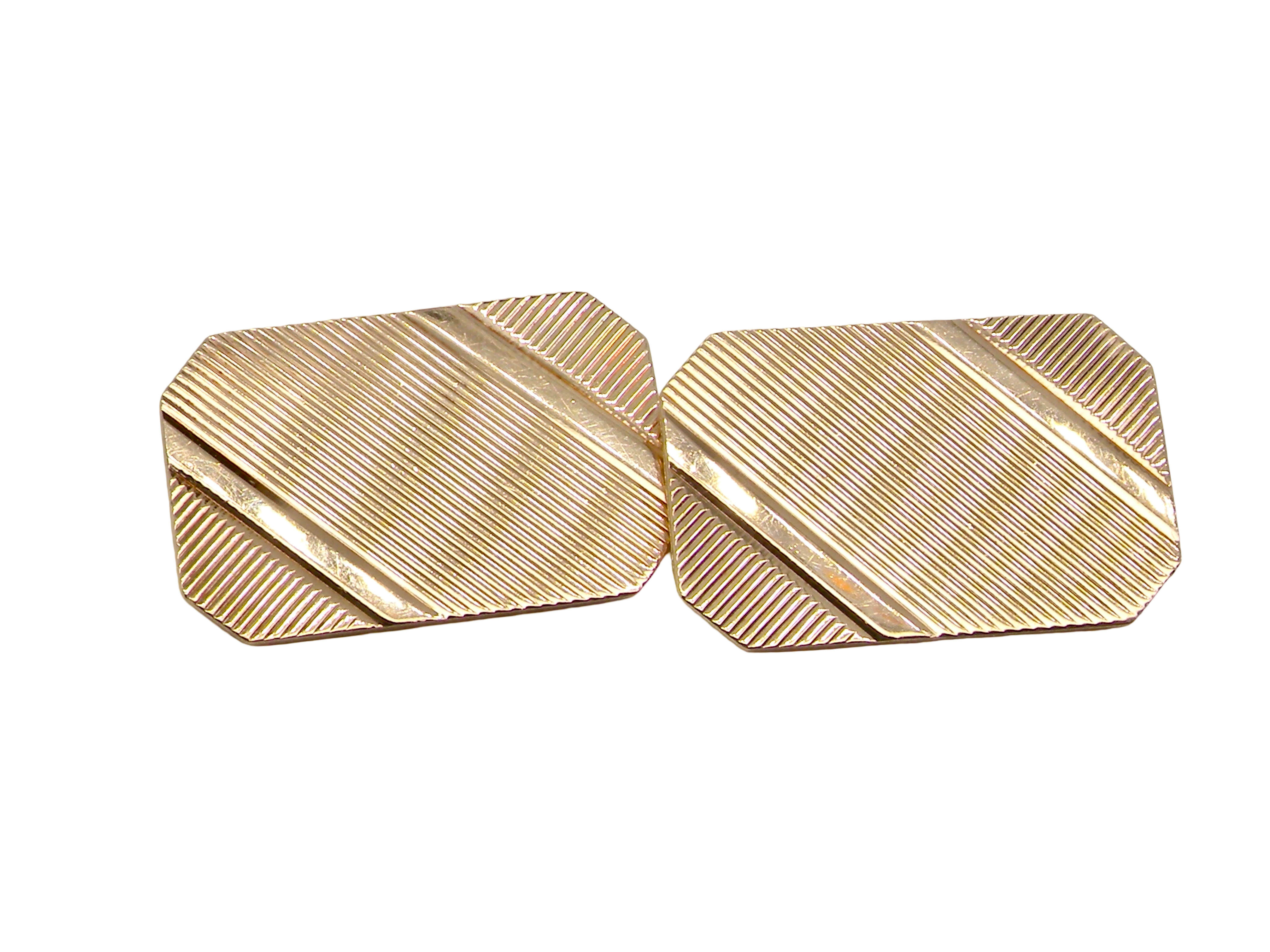 A pair of double link cufflinks. Each rectangular in shape, measure . 