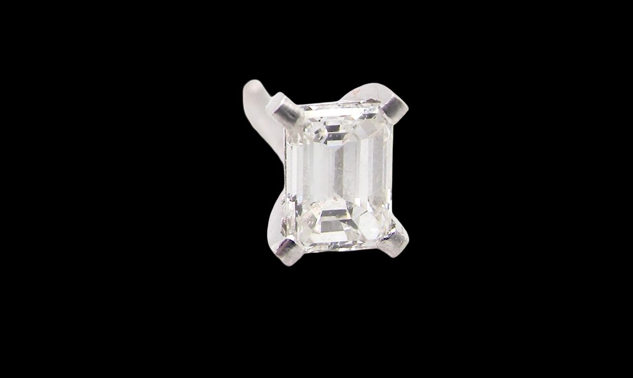 A pair of emerald cut diamond earring