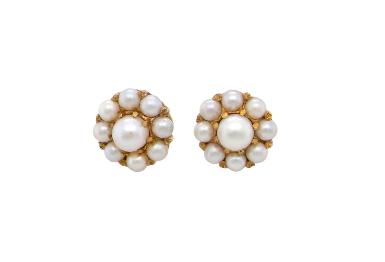 A pair of pearl cluster earrings