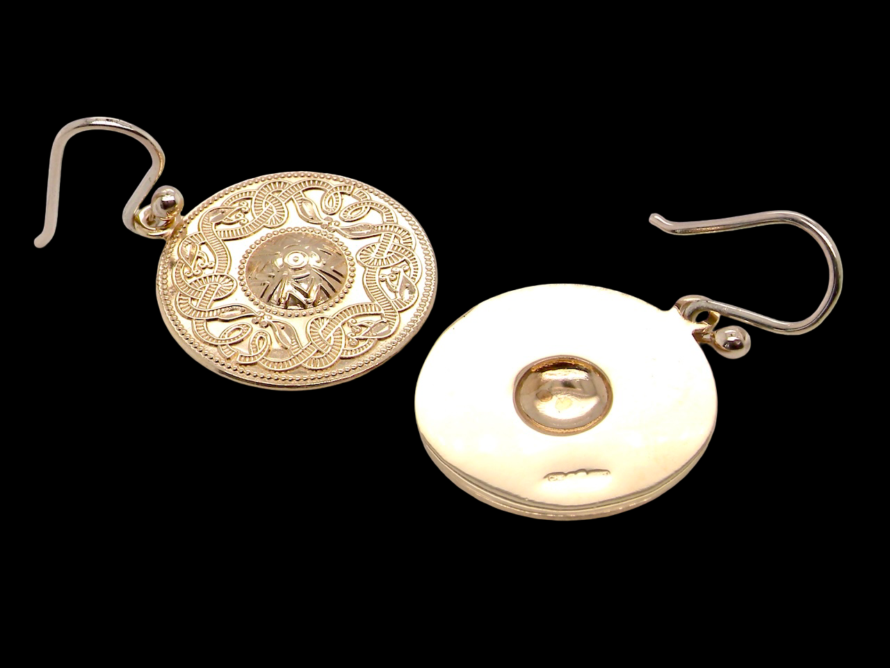 pair of round shaped earrings