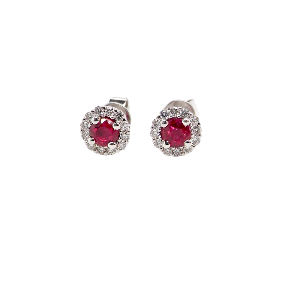 A pair of ruby and diamond earrings
