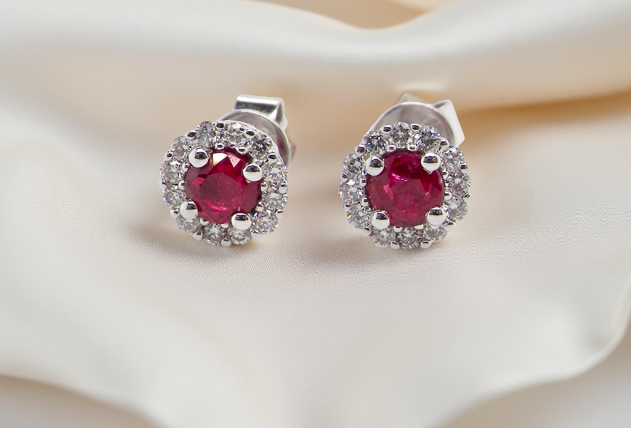A pair of ruby and diamond earrings