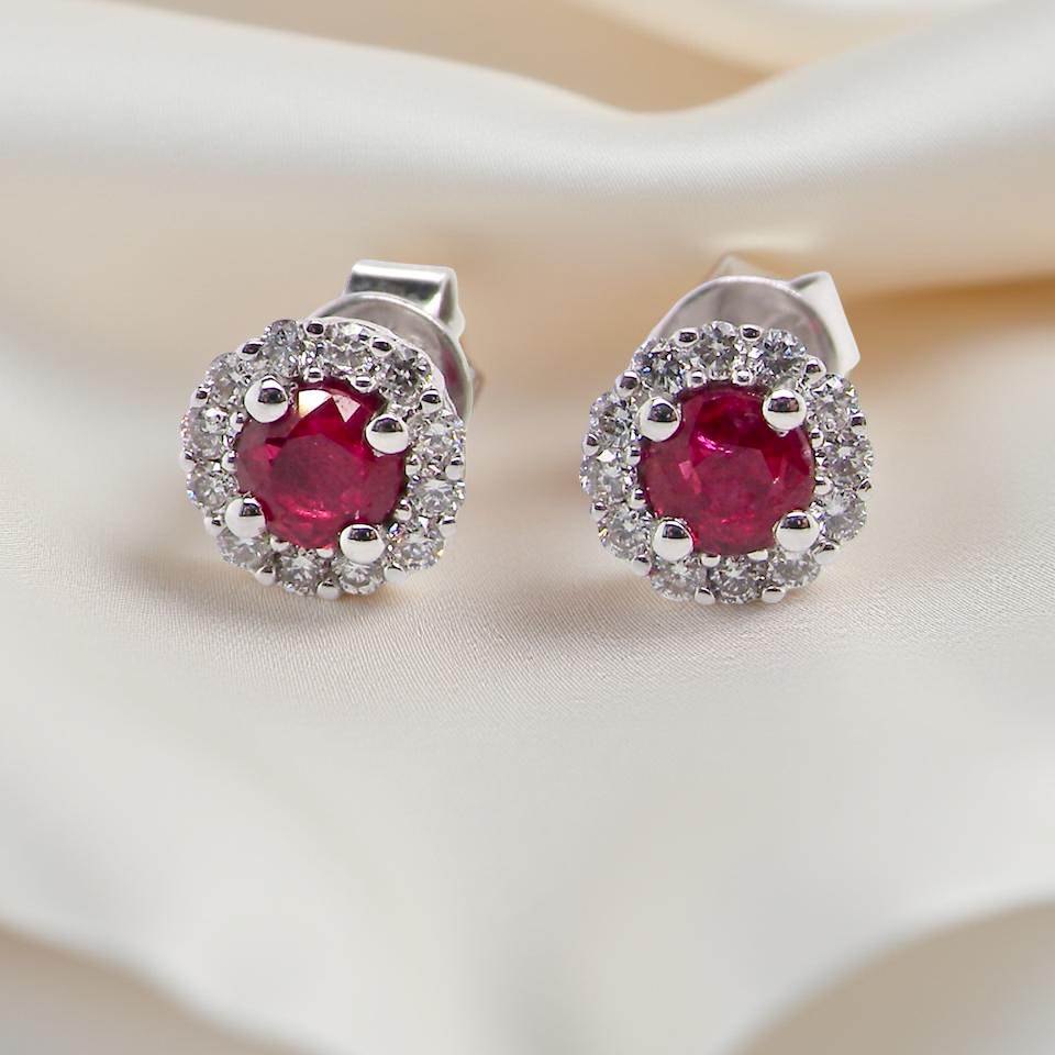 A pair of ruby and diamond earrings