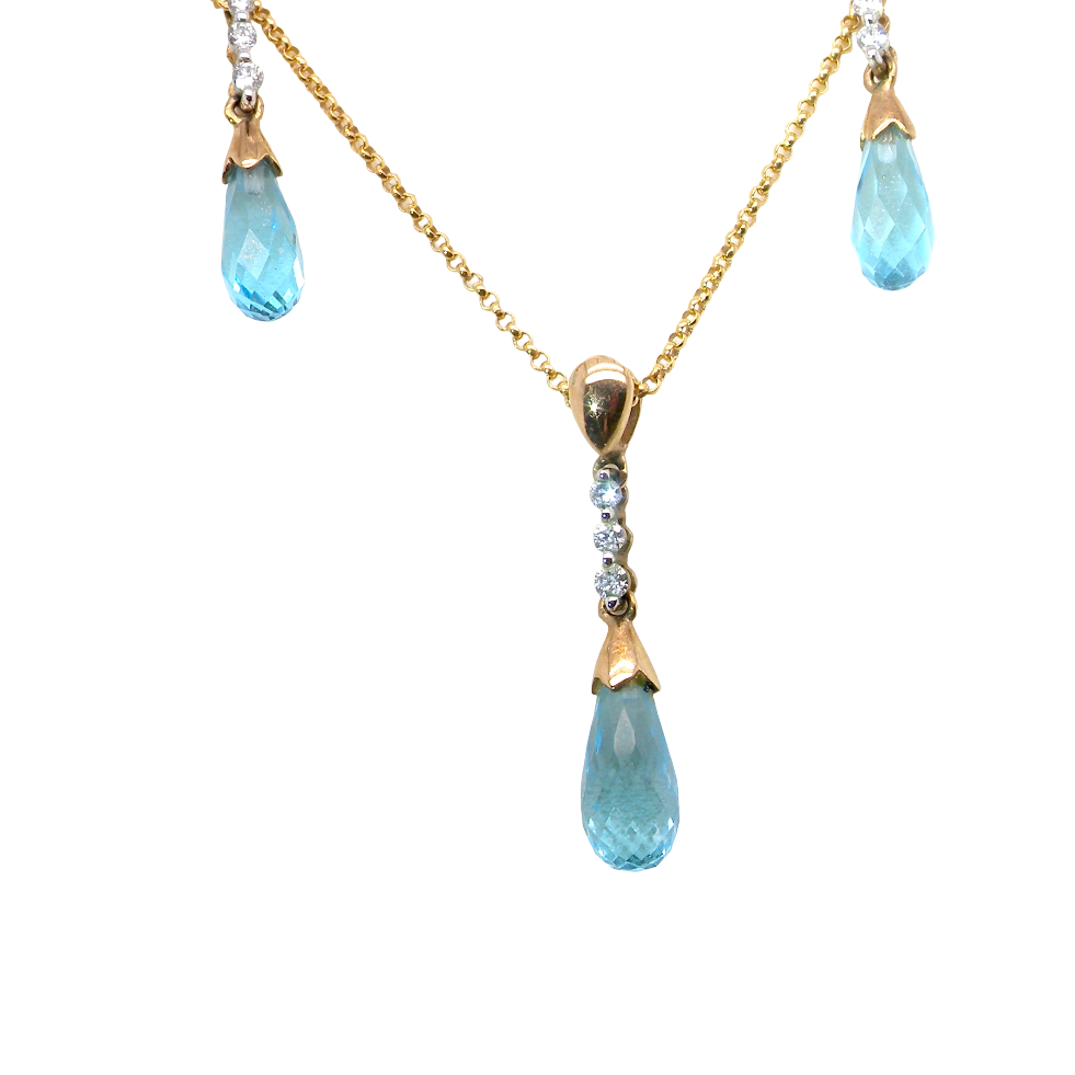 A pendant and earring set. The pendant has a pear shaped facet cut blue topaz 10x5mm. Above this three brilliant cut white cubic zirconia stones ,length 20mm.