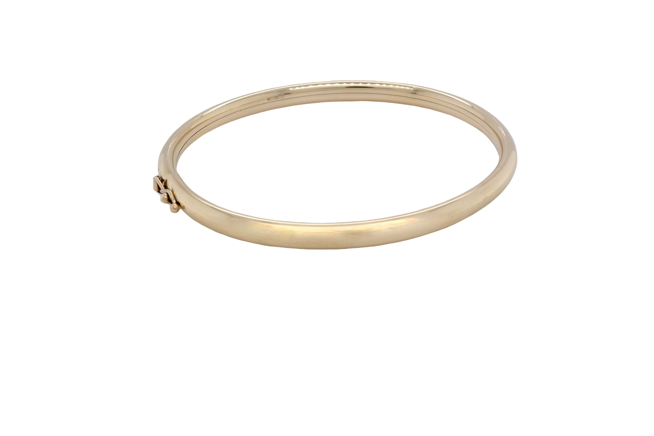 A plain 9 carat gold bangle