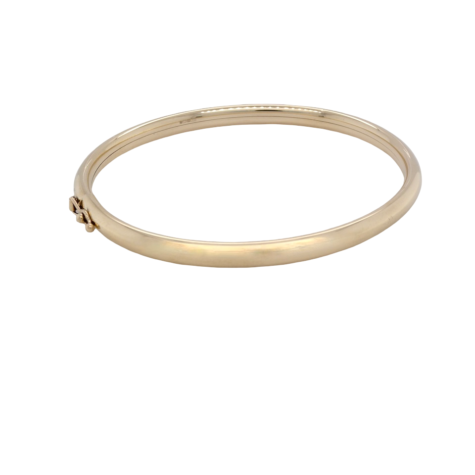 A plain 9 carat gold bangle