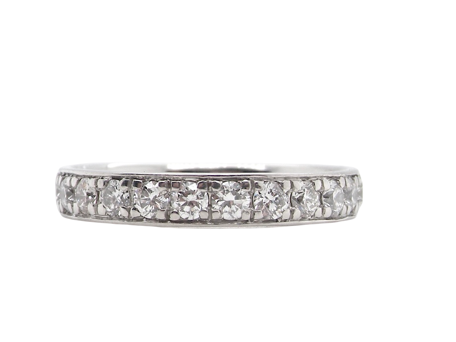 A platinum half hoop diamond eternity ring
