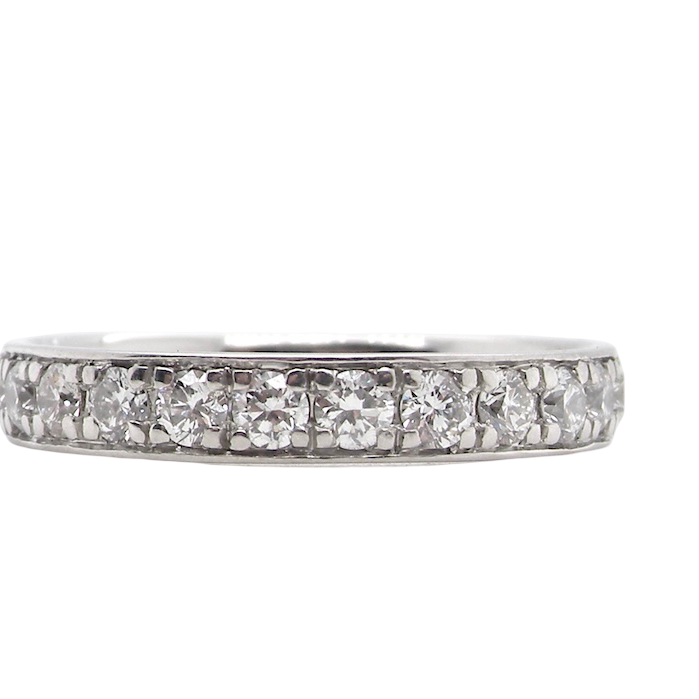 A platinum half hoop diamond eternity ring