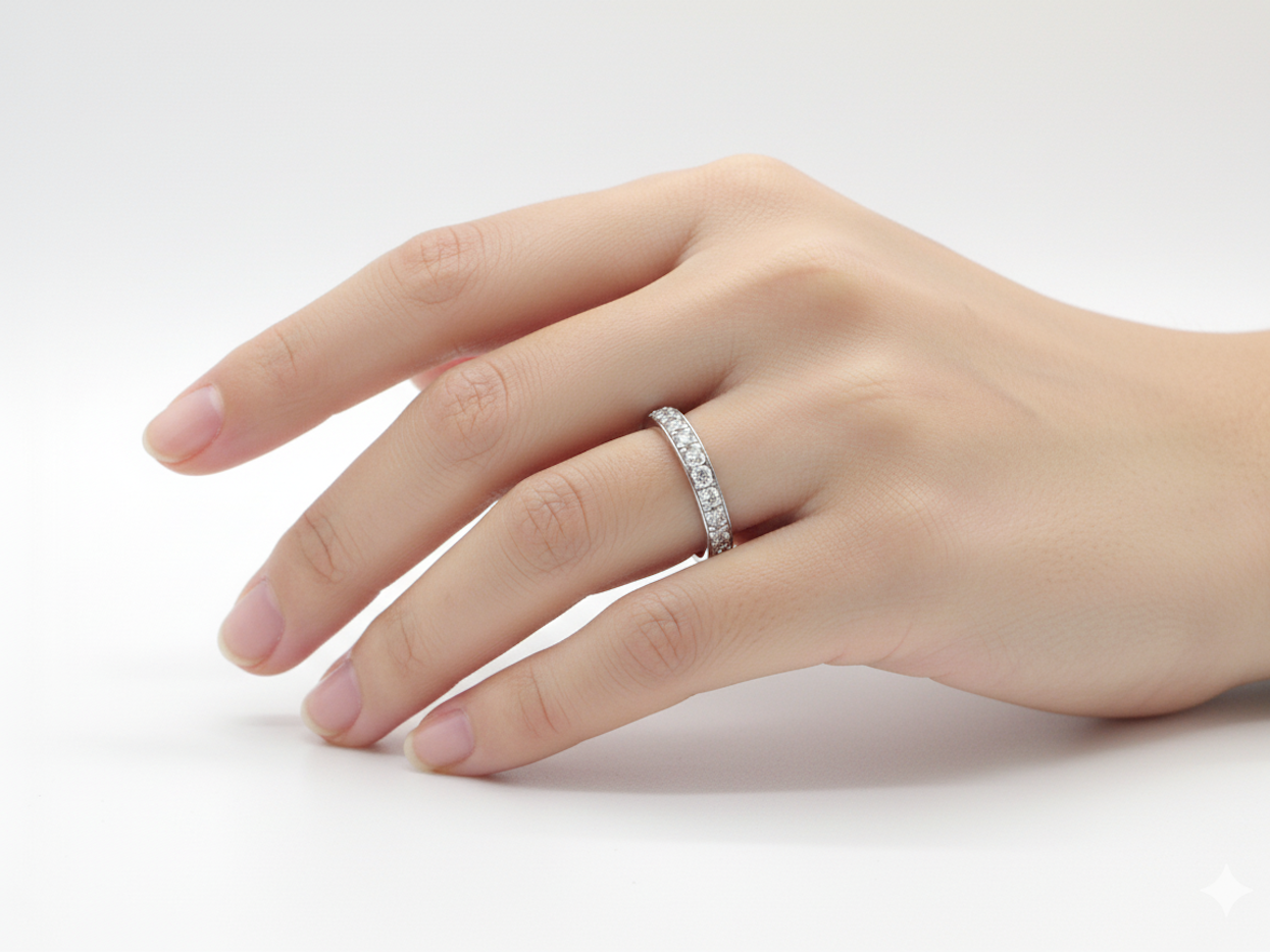 A platinum half hoop diamond eternity ring
