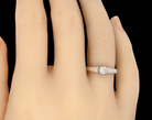 A platinum solitaire Diamond ring