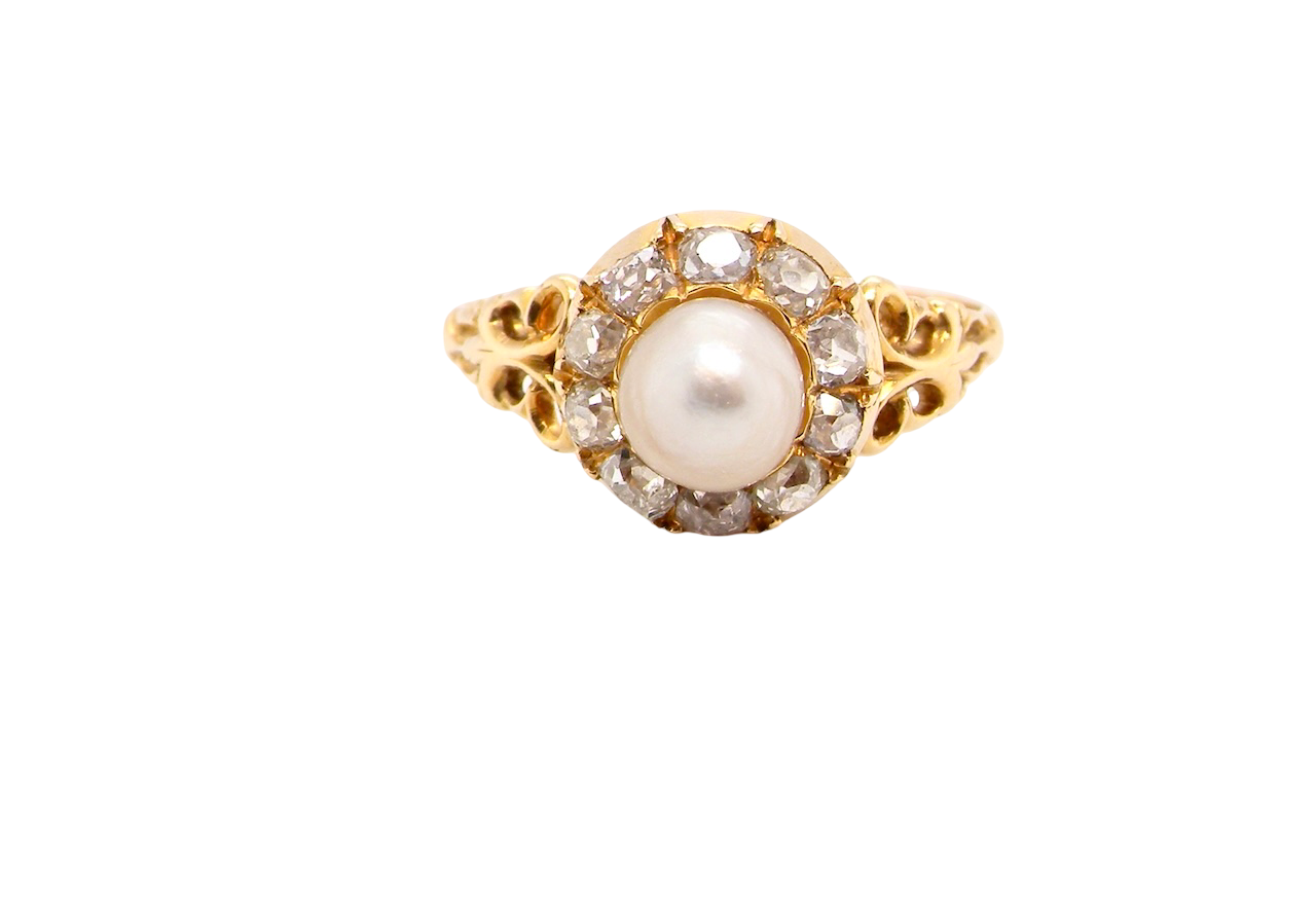 A pretty cluster ring set with a central cultured pearl