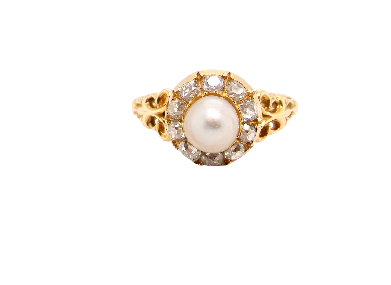 A pretty cluster ring set with a central cultured pearl