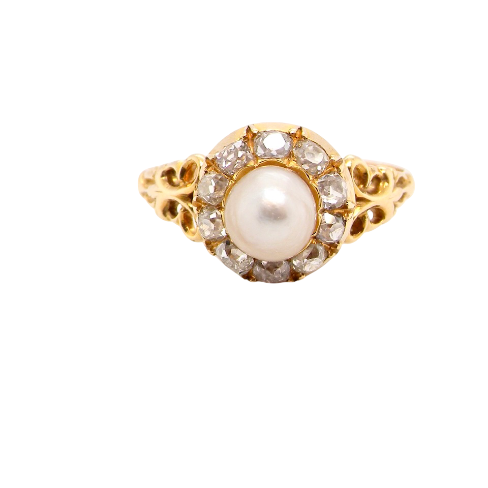 A pretty cluster ring set with a central cultured pearl