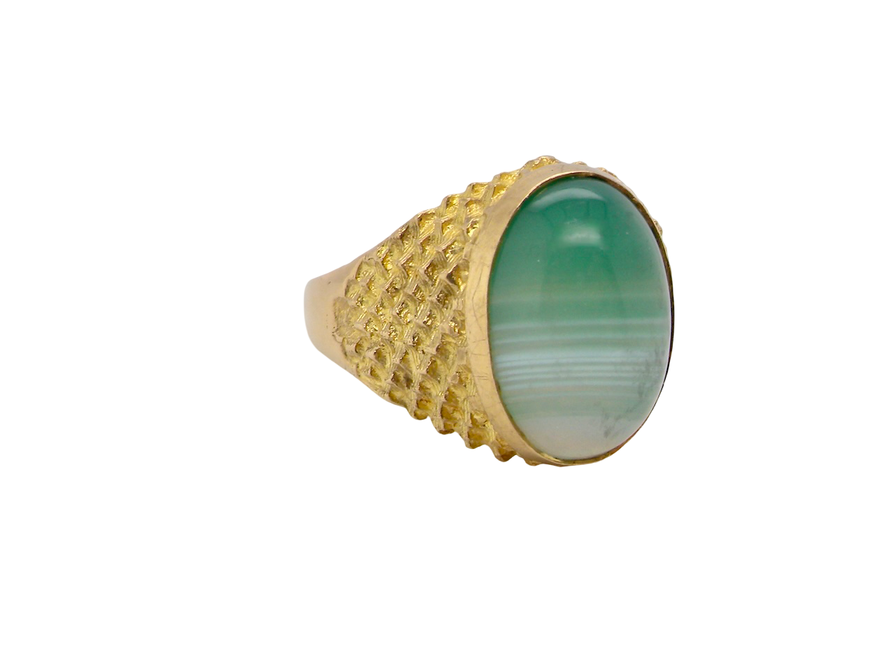 A pretty dress ring. Set with a cabouchon cut banded green agate , colours from jade green with stripes down to the base turning to white.