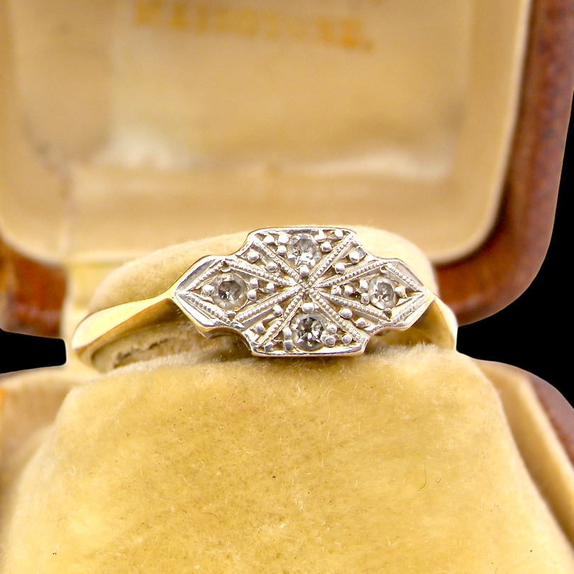 A pretty early 20th century Diamond ring, in its original box that makes this ring-extra special.