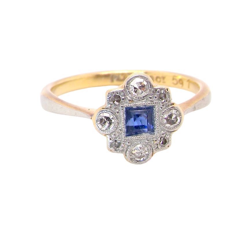 A pretty early 20th century cluster ring. The centre stone a square mid blue sapphire, 3x3mm,