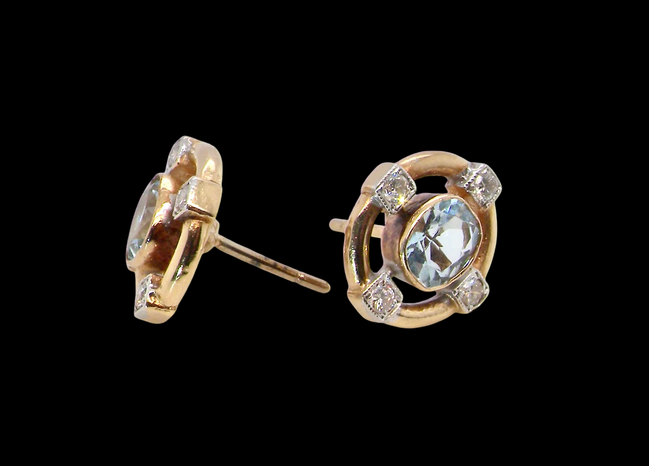 A pretty pair of earrings. Each is set with an aquamarine centre stone, 6x4.5mm, cushion shaped. Rear