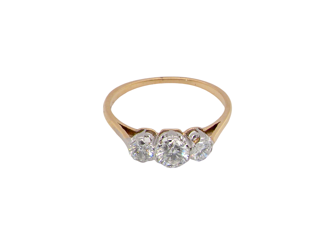 A pretty three stone trilogy ring that features three brilliant cut white diamonds.
Centre diamond, 5mm (est 0.50 carats) each side a 4mm diamond (est 0.25 carats). Colour G-h, clarity Si. Platinum rim style setting,