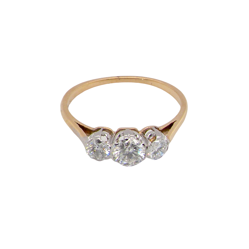 A pretty three stone trilogy ring that features three brilliant cut white diamonds.
Centre diamond, 5mm (est 0.50 carats) each side a 4mm diamond (est 0.25 carats). Colour G-h, clarity Si. Platinum rim style setting,
