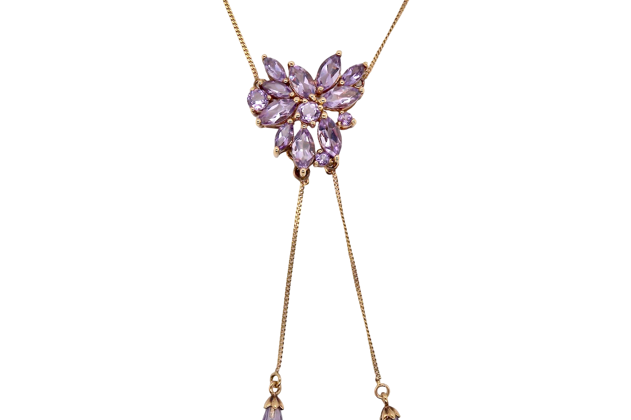Necklace with purple gemstones on a white background