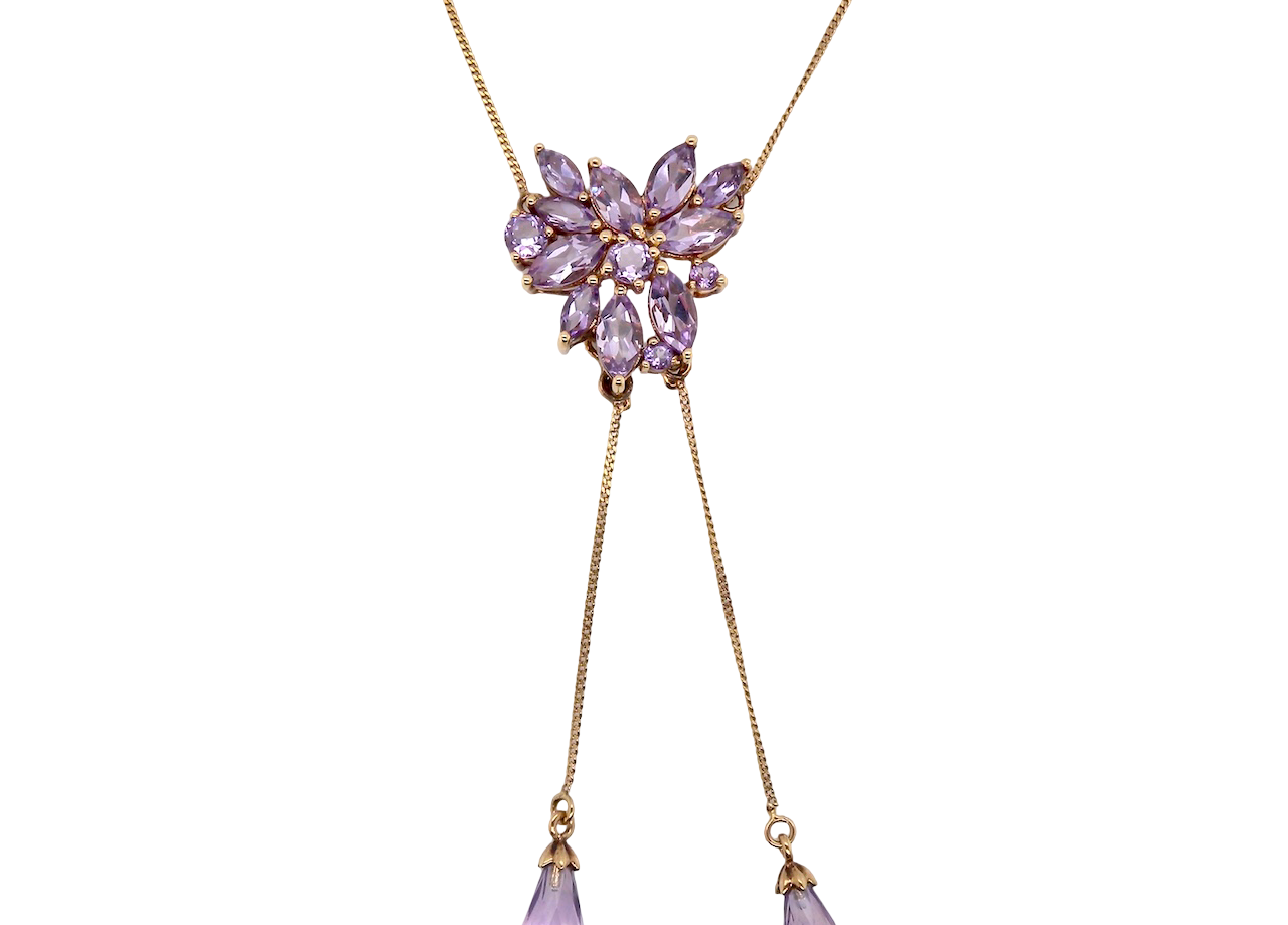 Necklace with purple gemstones on a white background