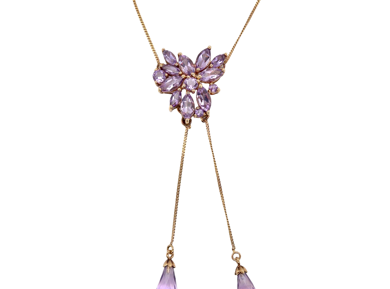 Necklace with purple gemstones on a white background