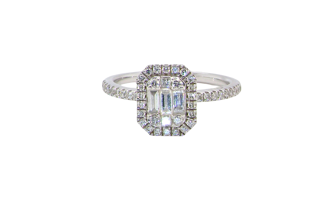 A rectangular diamond cluster ring. Centre portion is set with three baguette cut white diamonds 3x1.6mm and six mixed cut diamonds 2mm each.
Surrounded by a halo of small round diamonds