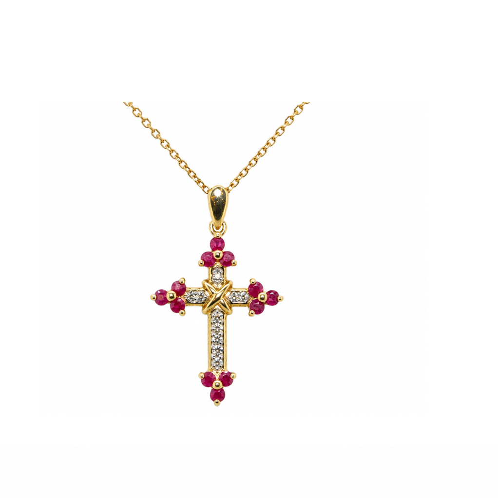 A ruby & diamond fancy cross