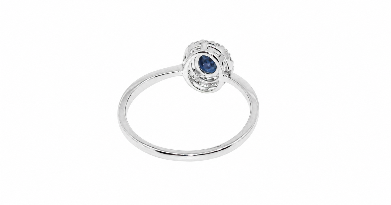 A sapphire & diamond cluster ring rear view