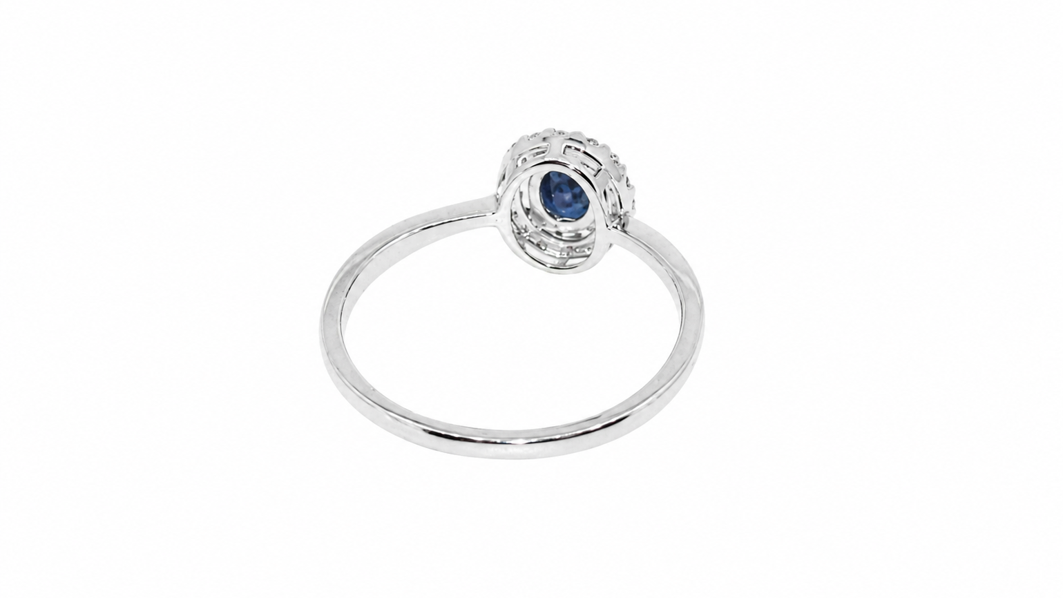 A sapphire & diamond cluster ring rear view