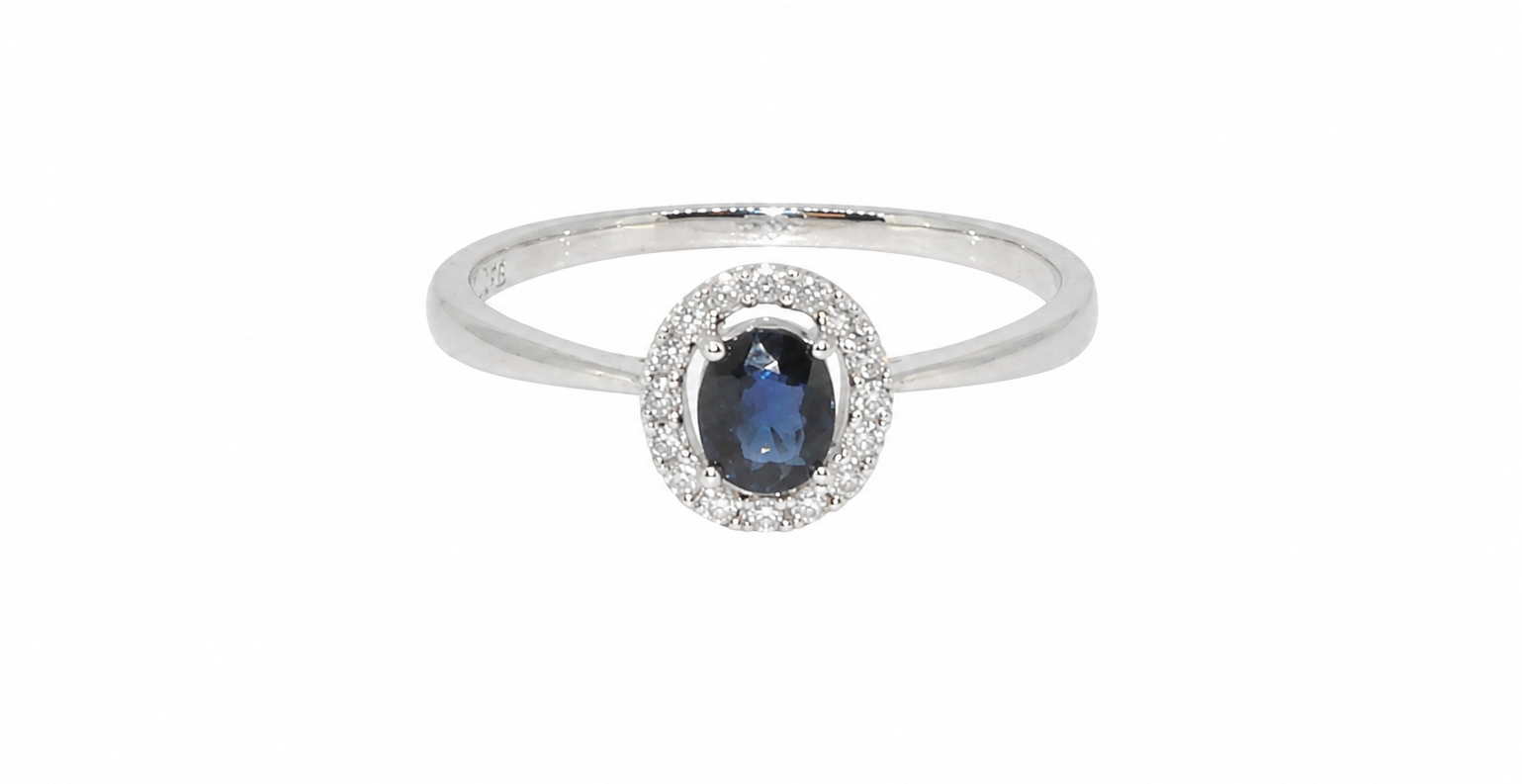 A sapphire & diamond cluster ring