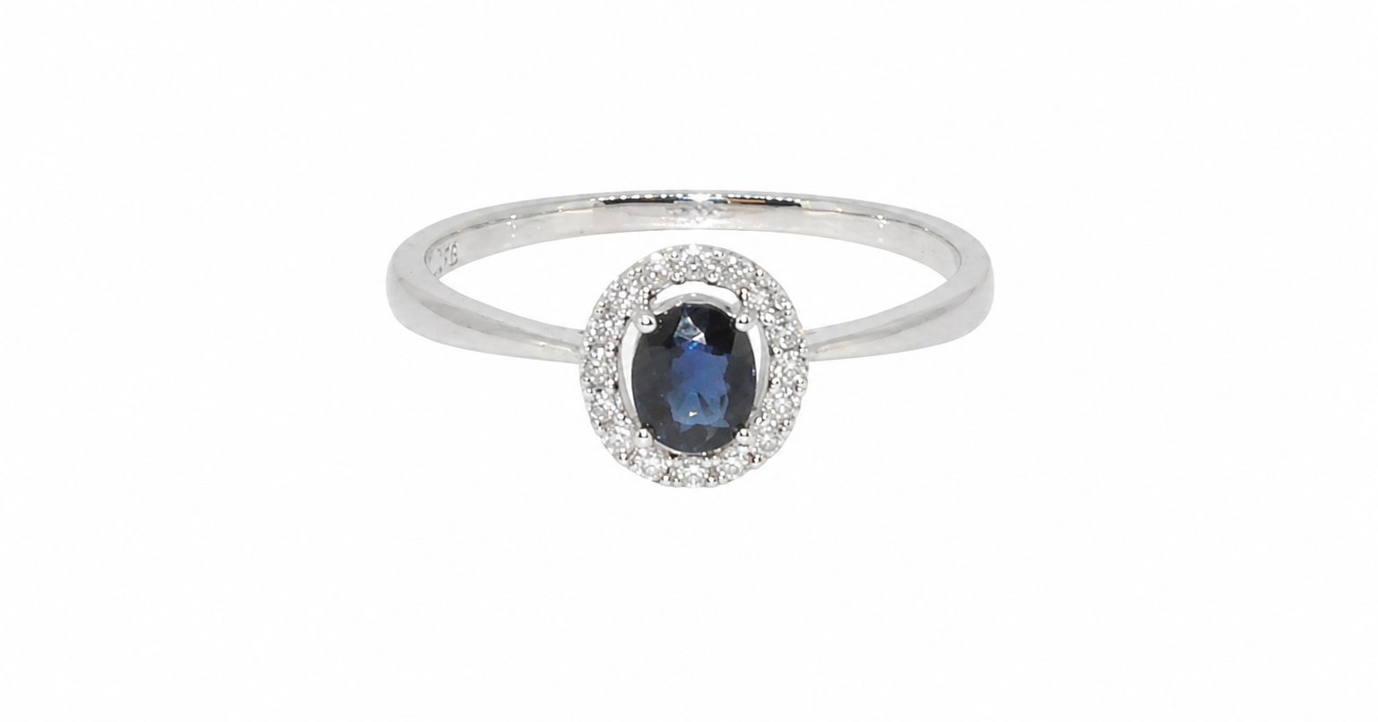 A sapphire & diamond cluster ring