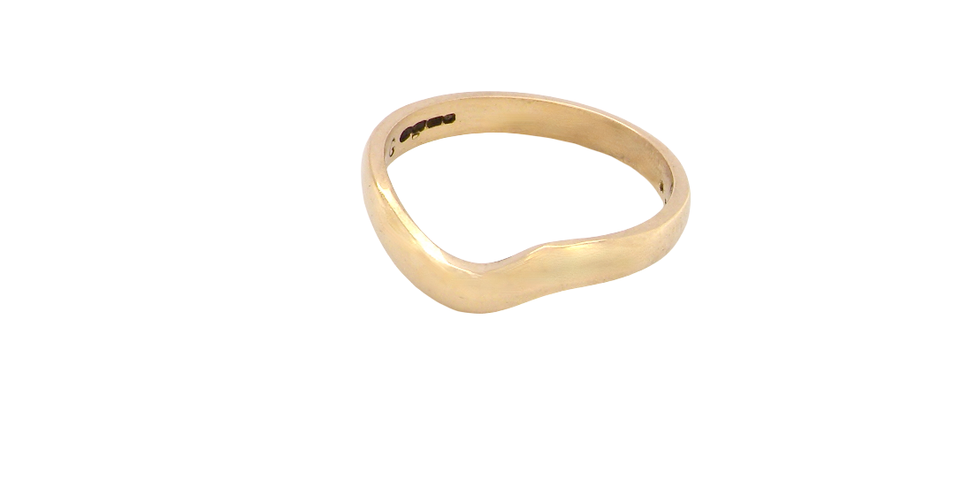 A shaped 18 carat yellow gold ring. Band width just under 3mm,
