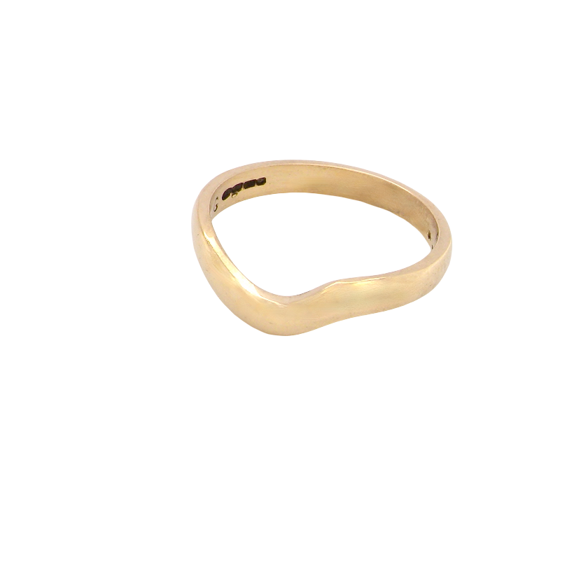 A shaped 18 carat yellow gold ring. Band width just under 3mm,
