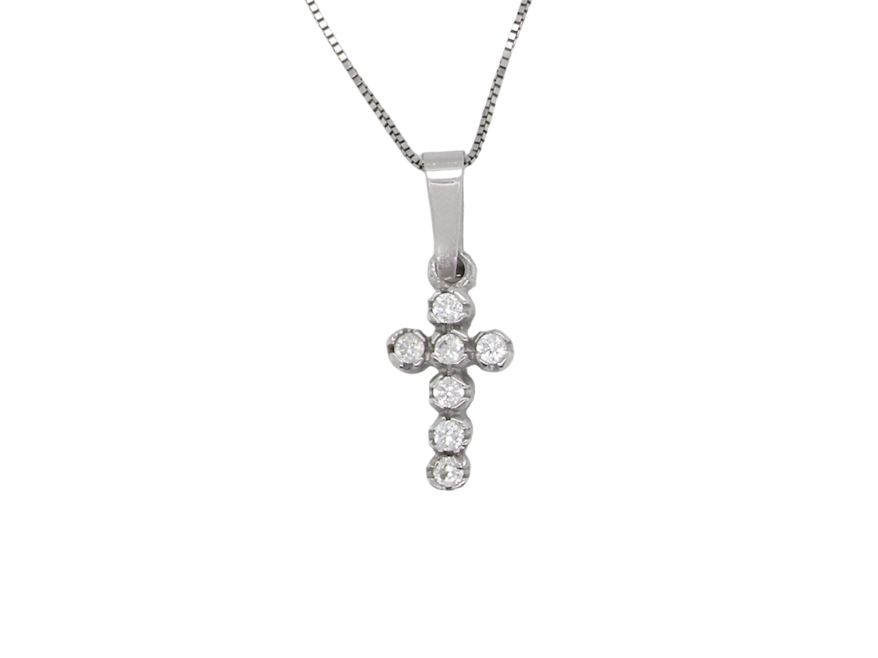 A small cross pendant in 18 carat white gold, set with seven brilliant-cut white diamonds.